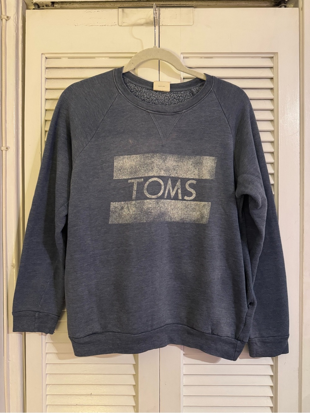 TOMS Navy Blue Crewneck Fleece-Lined Sweatshirt with White Logo and Pockets